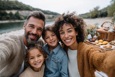 Happy Family Taking A Selfie During A Picnic