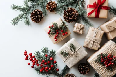 Christmas Gift Boxes With Pine Cones And Berries