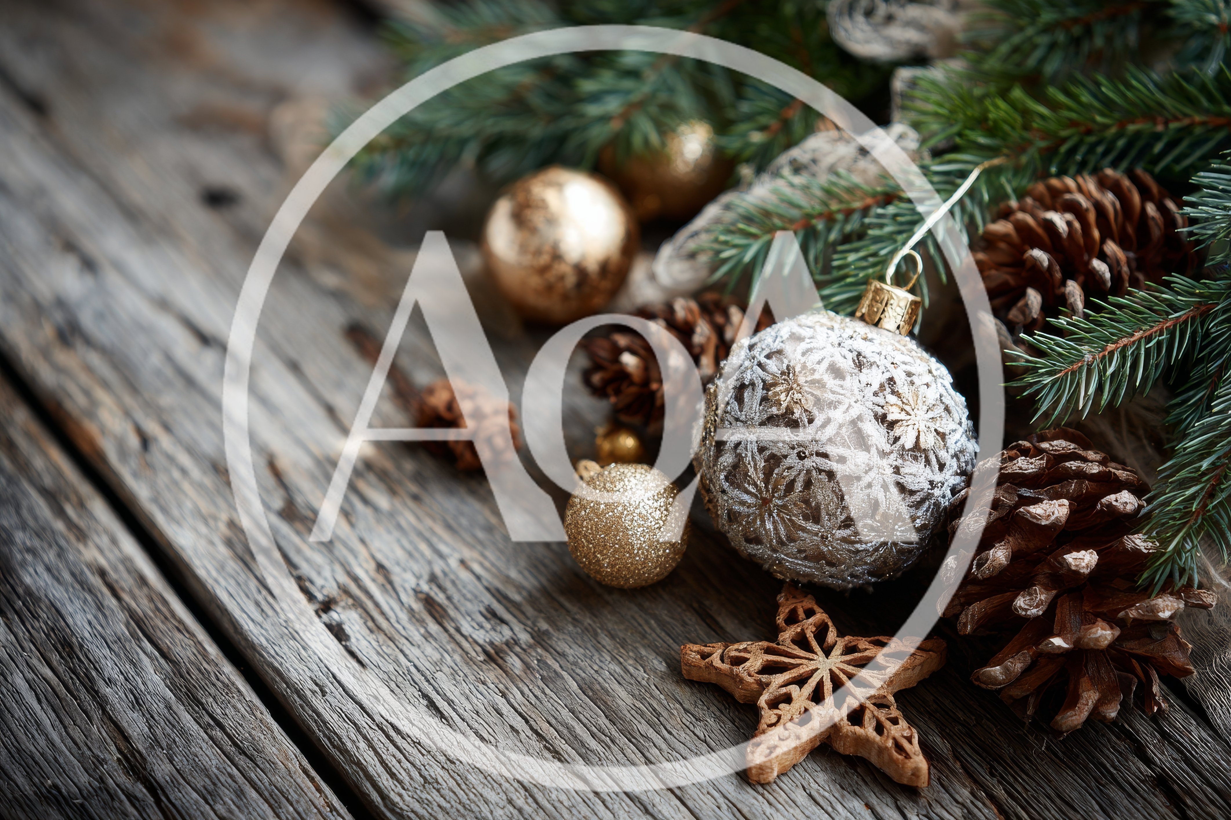 Christmas Ornaments And Pine Cones On Rustic Wood