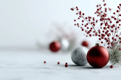 Red and Silver Christmas Ornaments on Marble Surface