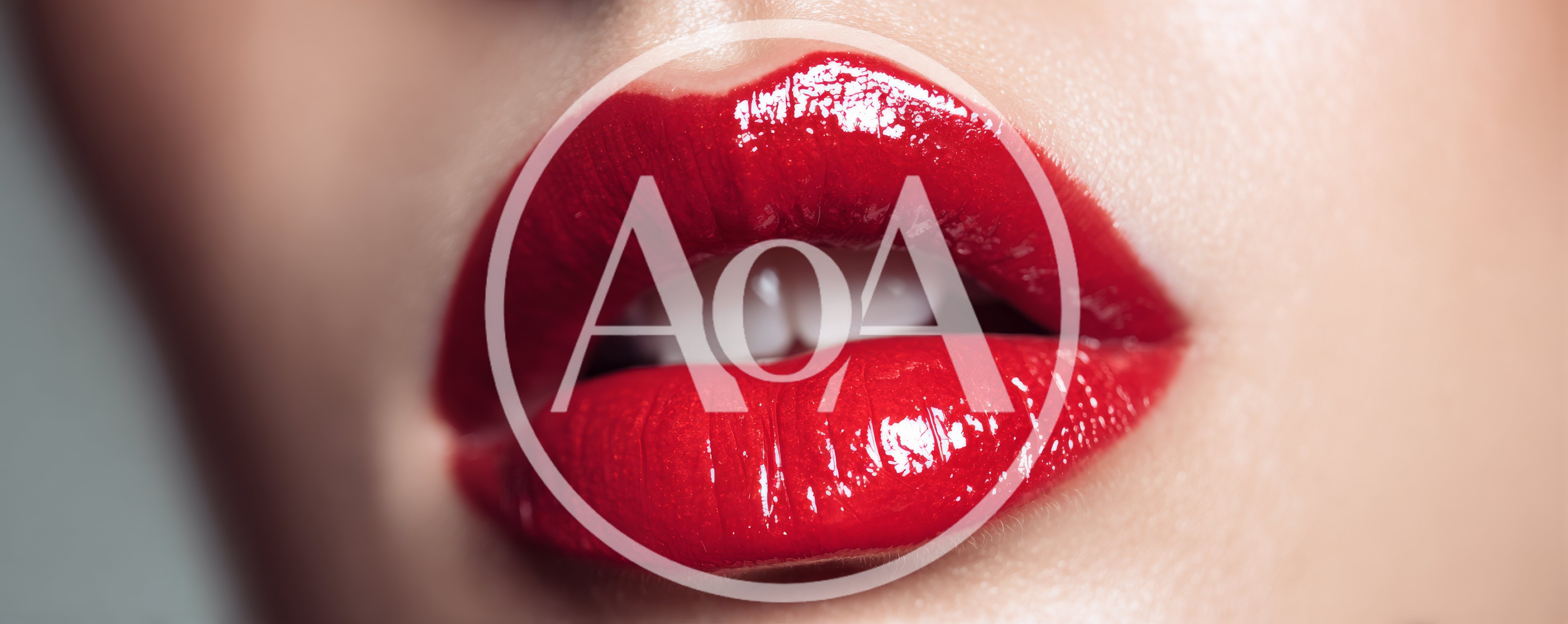 Close Up Of Woman Wearing Glossy Red Lipstick