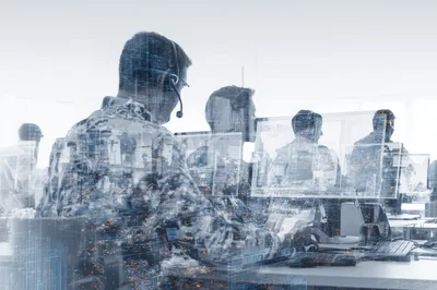Customer Support Agents Working In A Modern Office