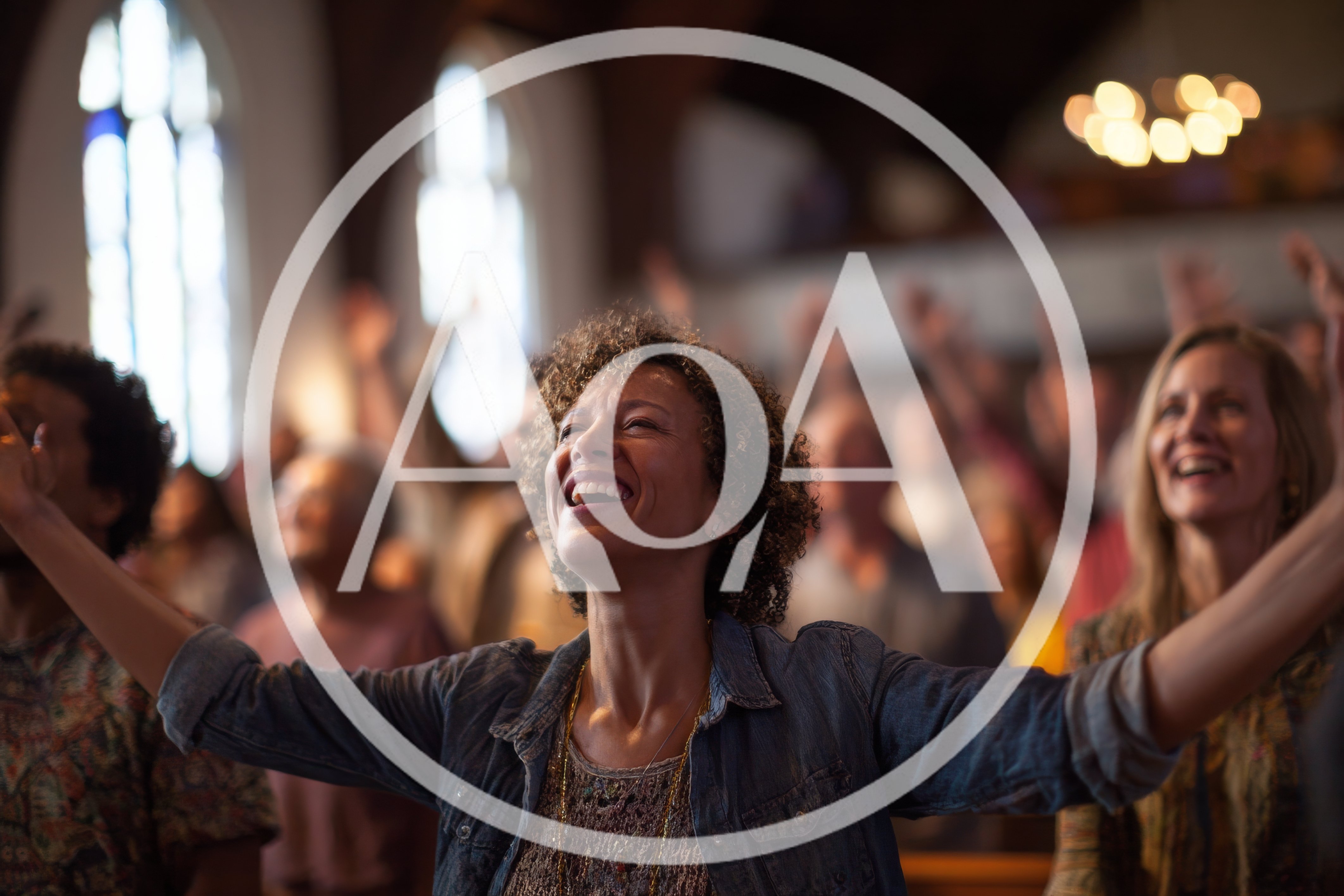 Diverse Congregation Worshipping With Raised Hands In Church