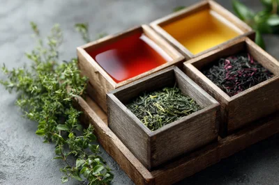 Assorted Tea Leaves and Infusions in Wooden Boxes