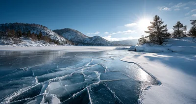 Cracked Ice Surface On A Frozen Mountain Lake