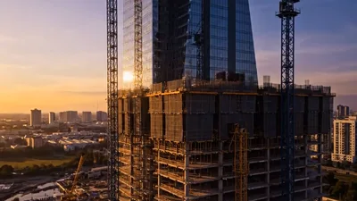 Aerial View Of Skyscraper Construction At Sunset