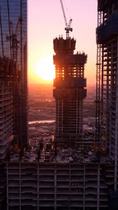 Construction Site Of Skyscrapers At Sunset