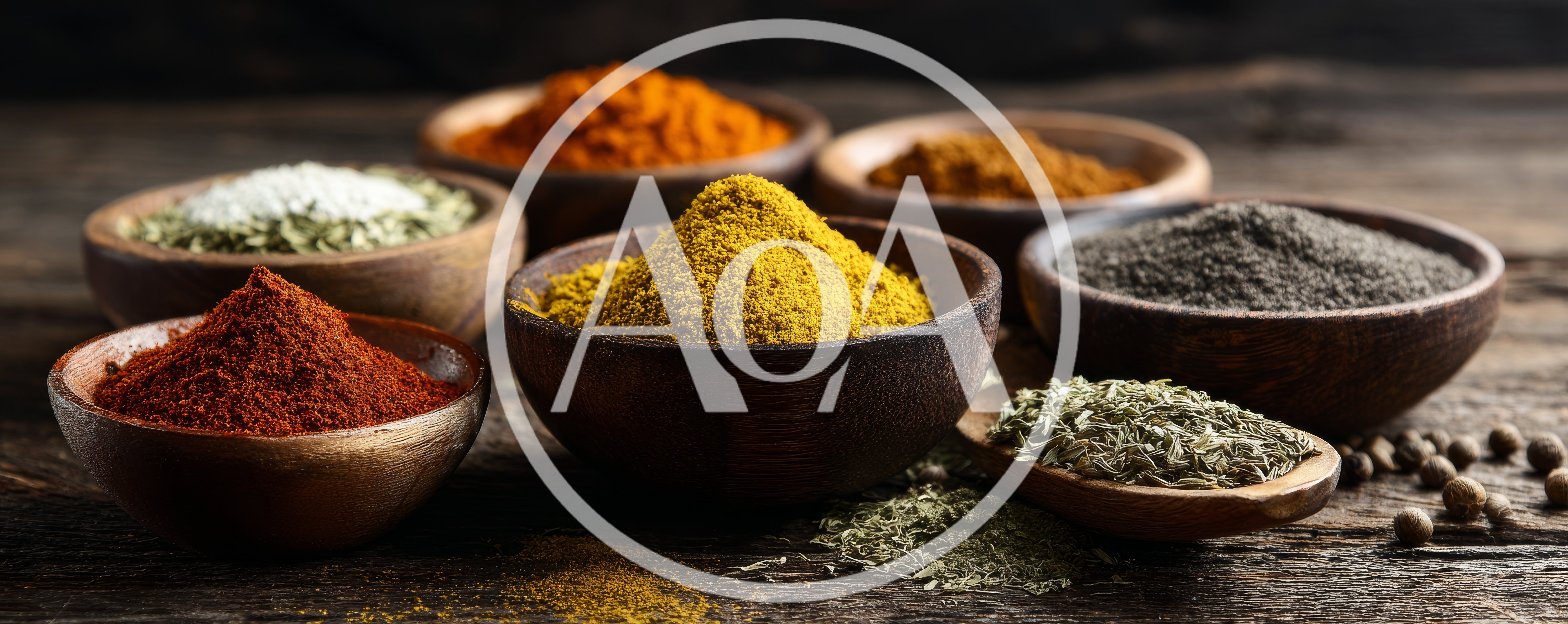 Assorted Spices In Wooden Bowls On Rustic Table