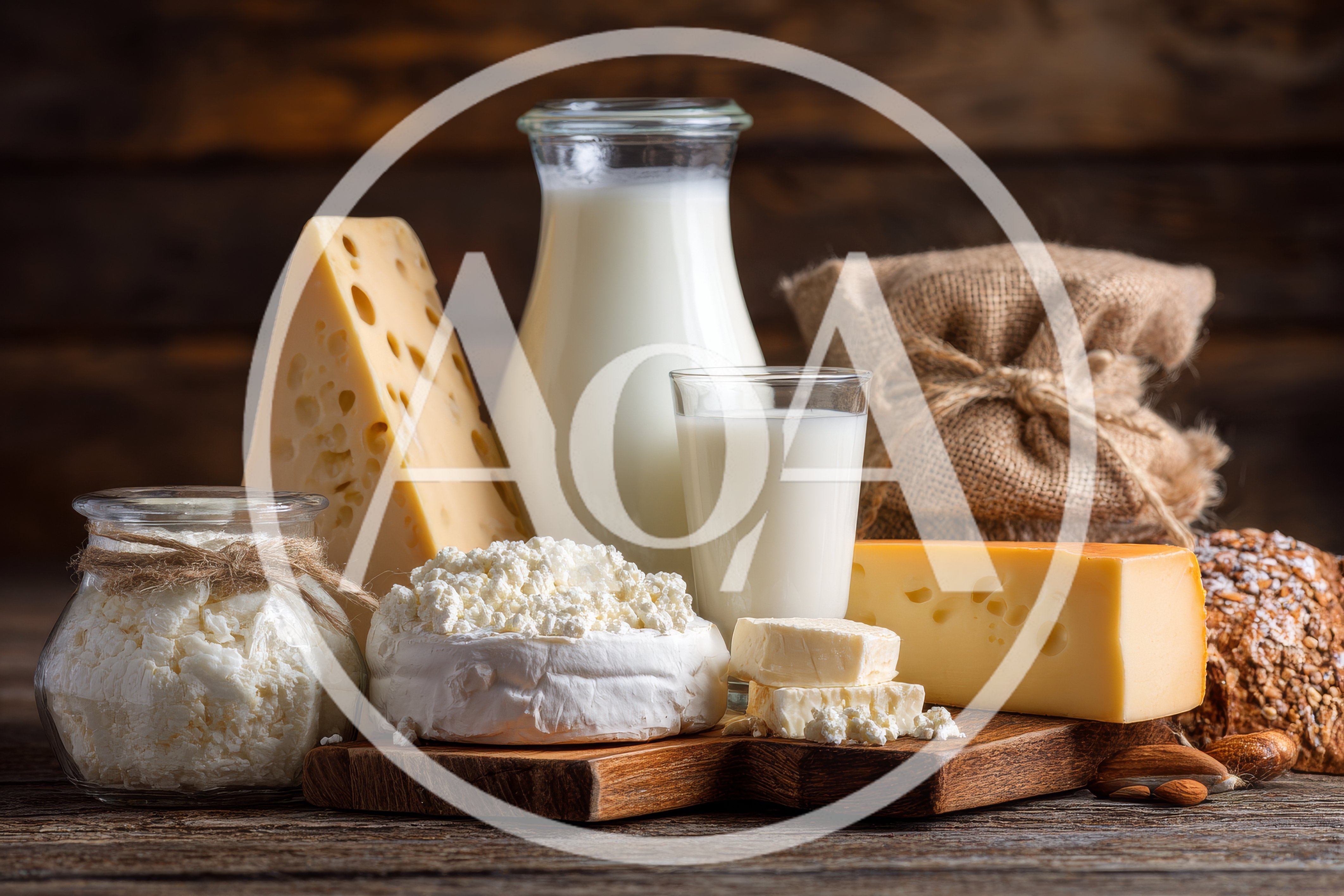 Assorted Dairy Products and Fresh Cheese on Wooden Table