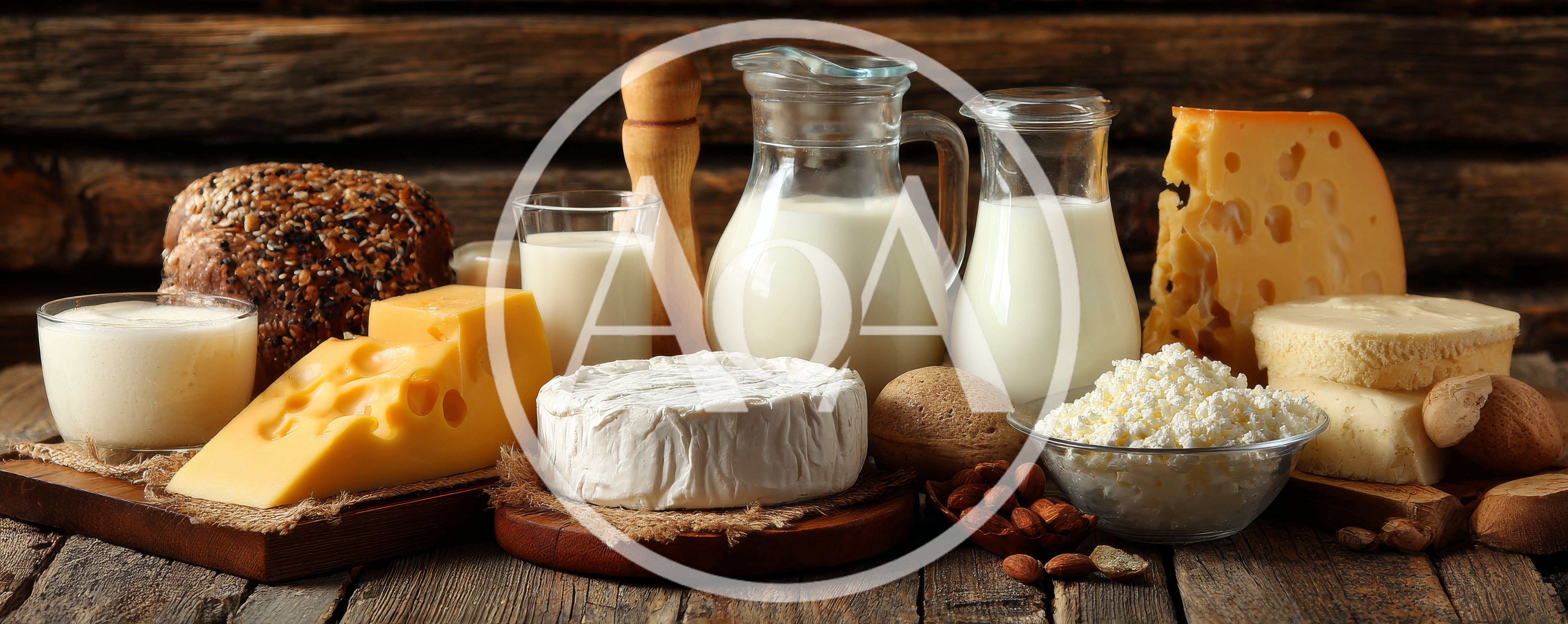 Assorted Dairy Products and Bread on Rustic Wooden Table