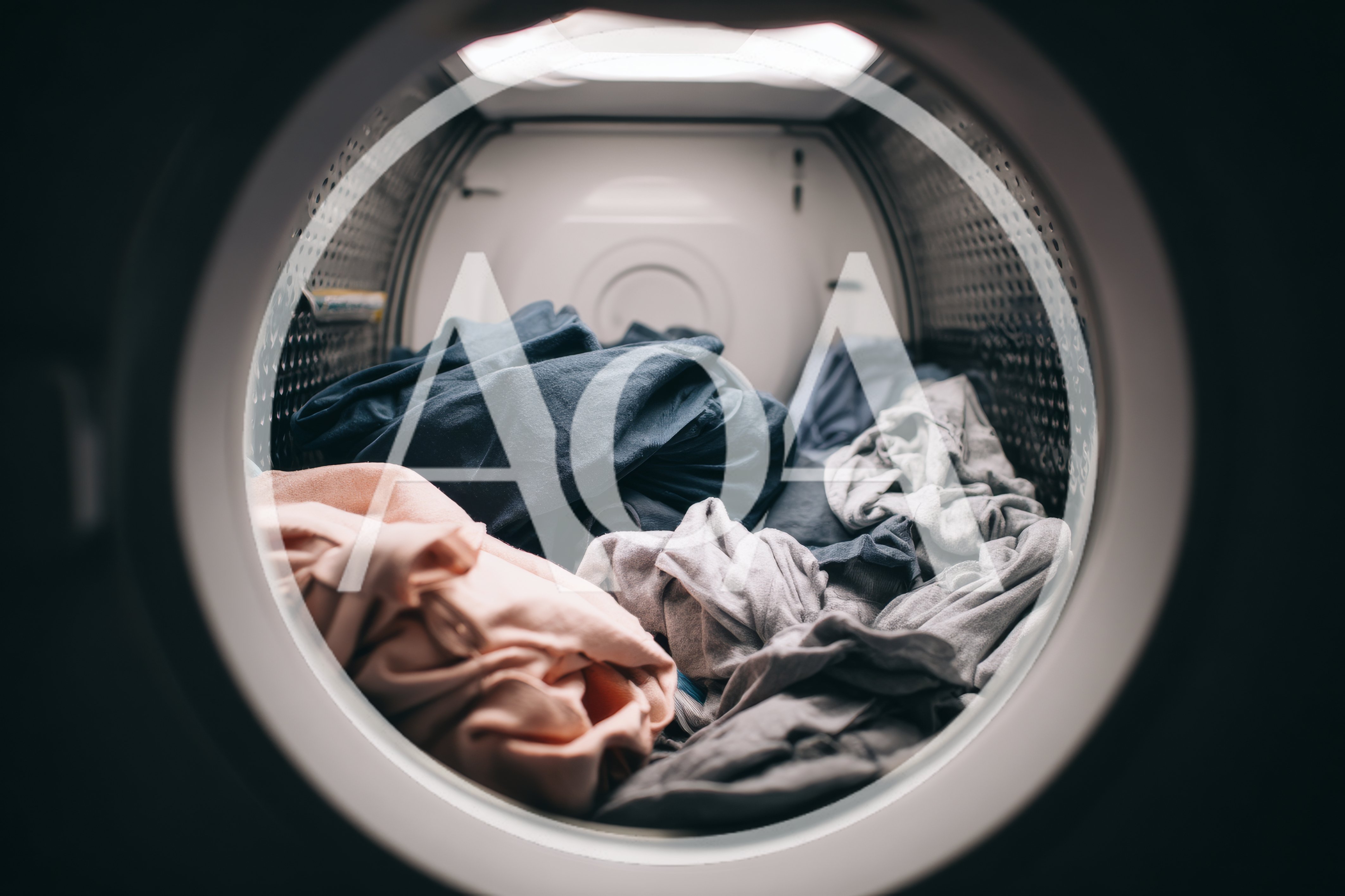 Inside View Of A Clothes Dryer With Laundry