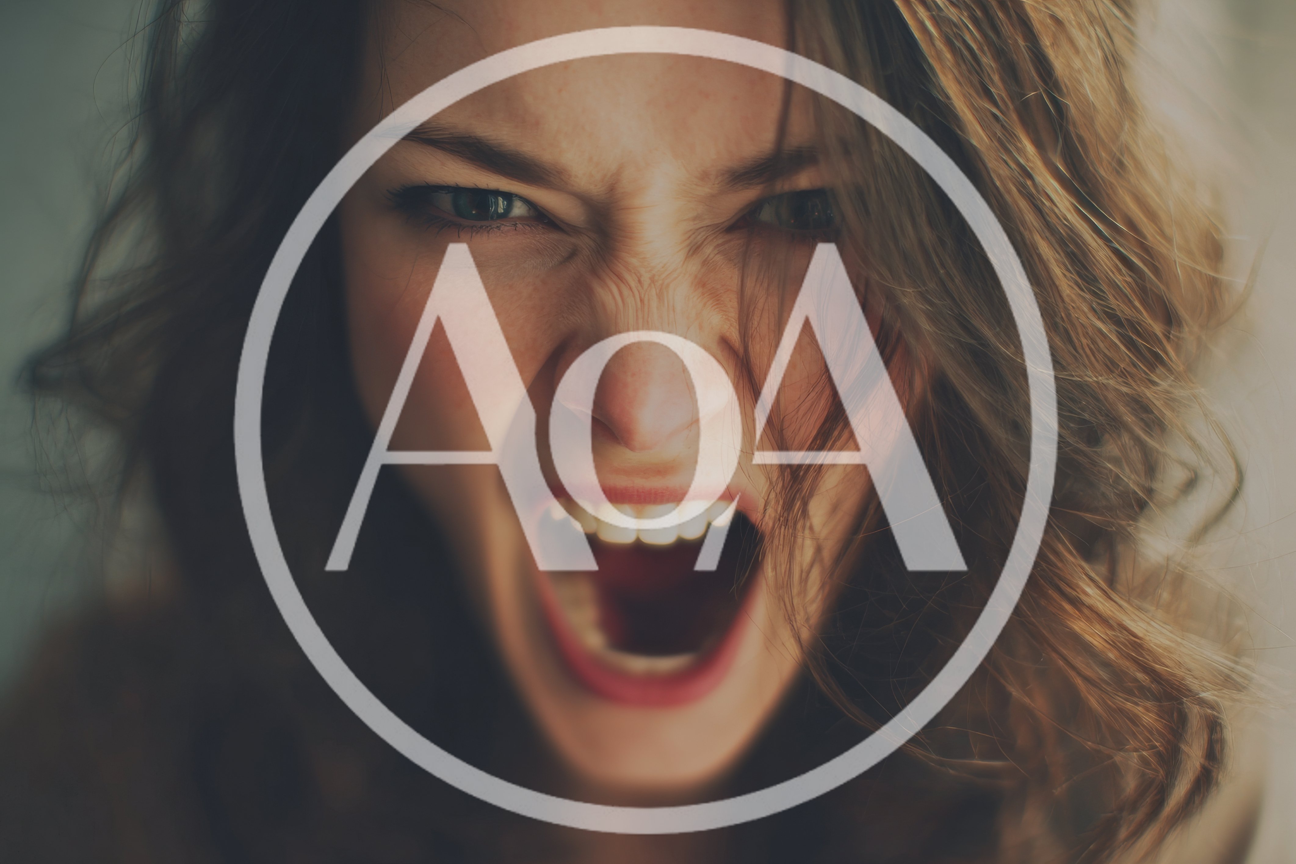 Close Up Portrait Of An Angry Screaming Woman