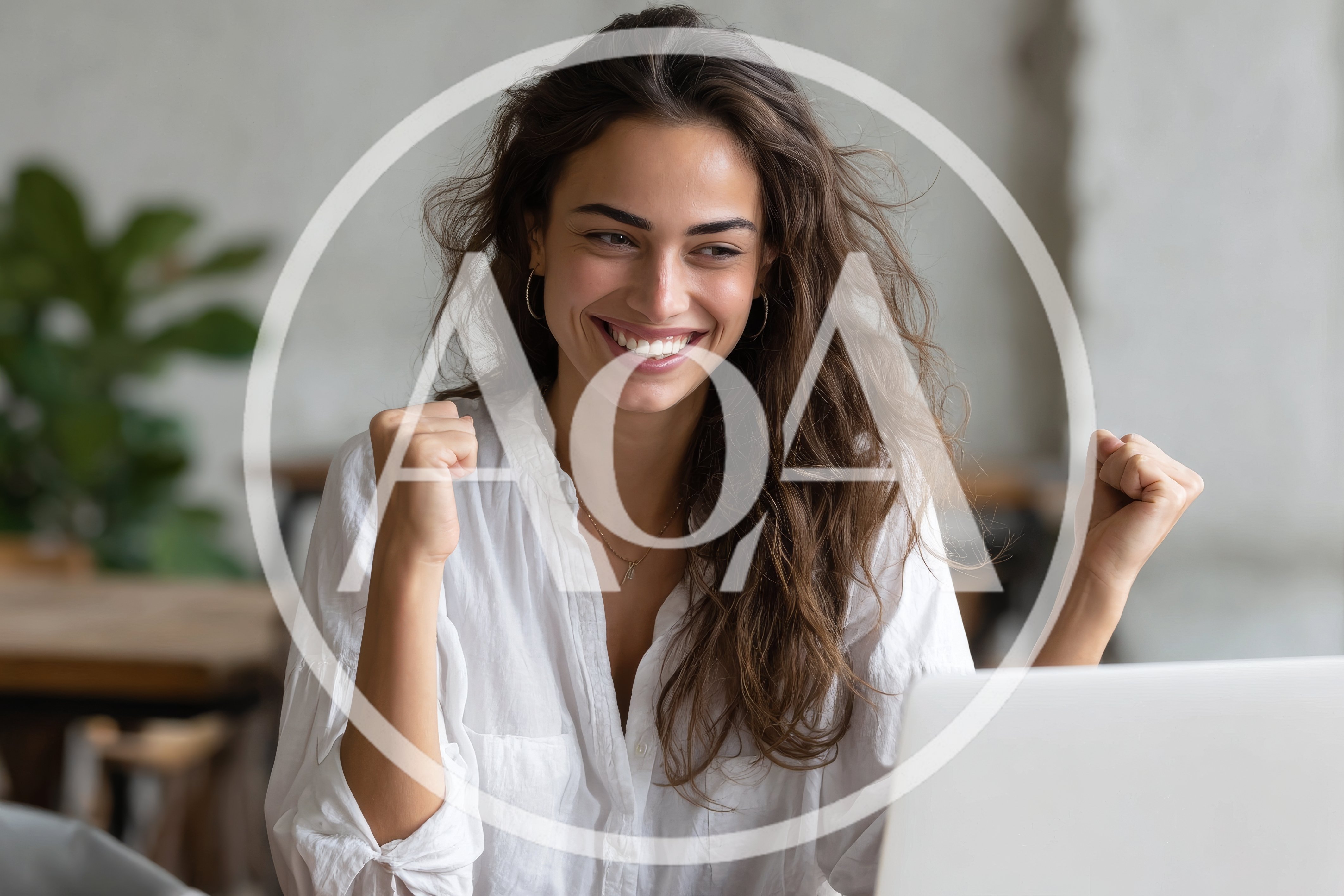 Excited Young Woman Celebrating Success On Laptop