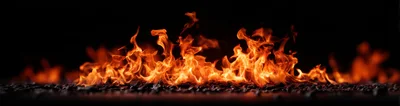 Panoramic View Of Intense Fire Flames On Black Background