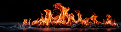 Bright Orange Flames Burning On Dark Ground