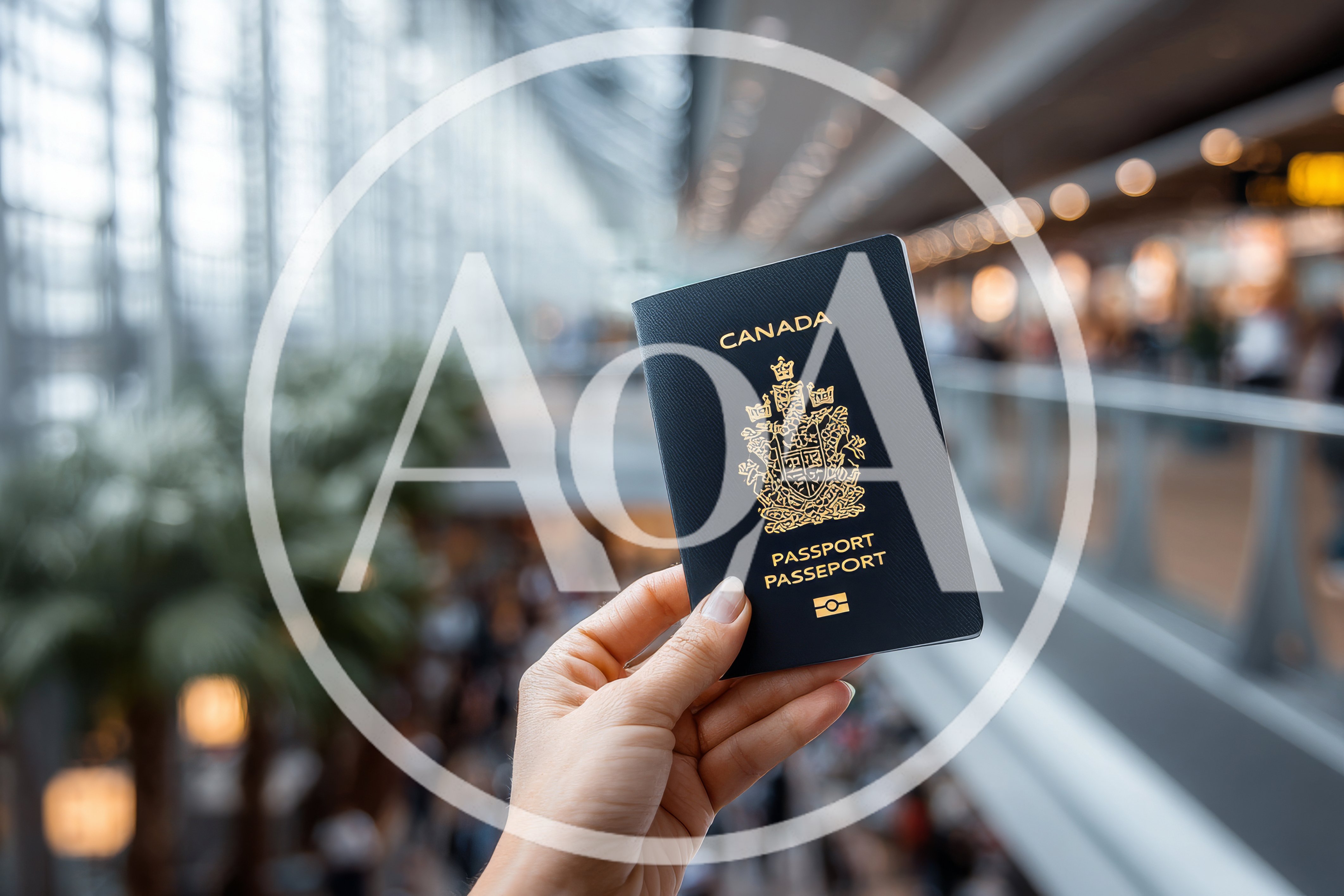 Hand Holding A Canadian Passport In An Airport Terminal