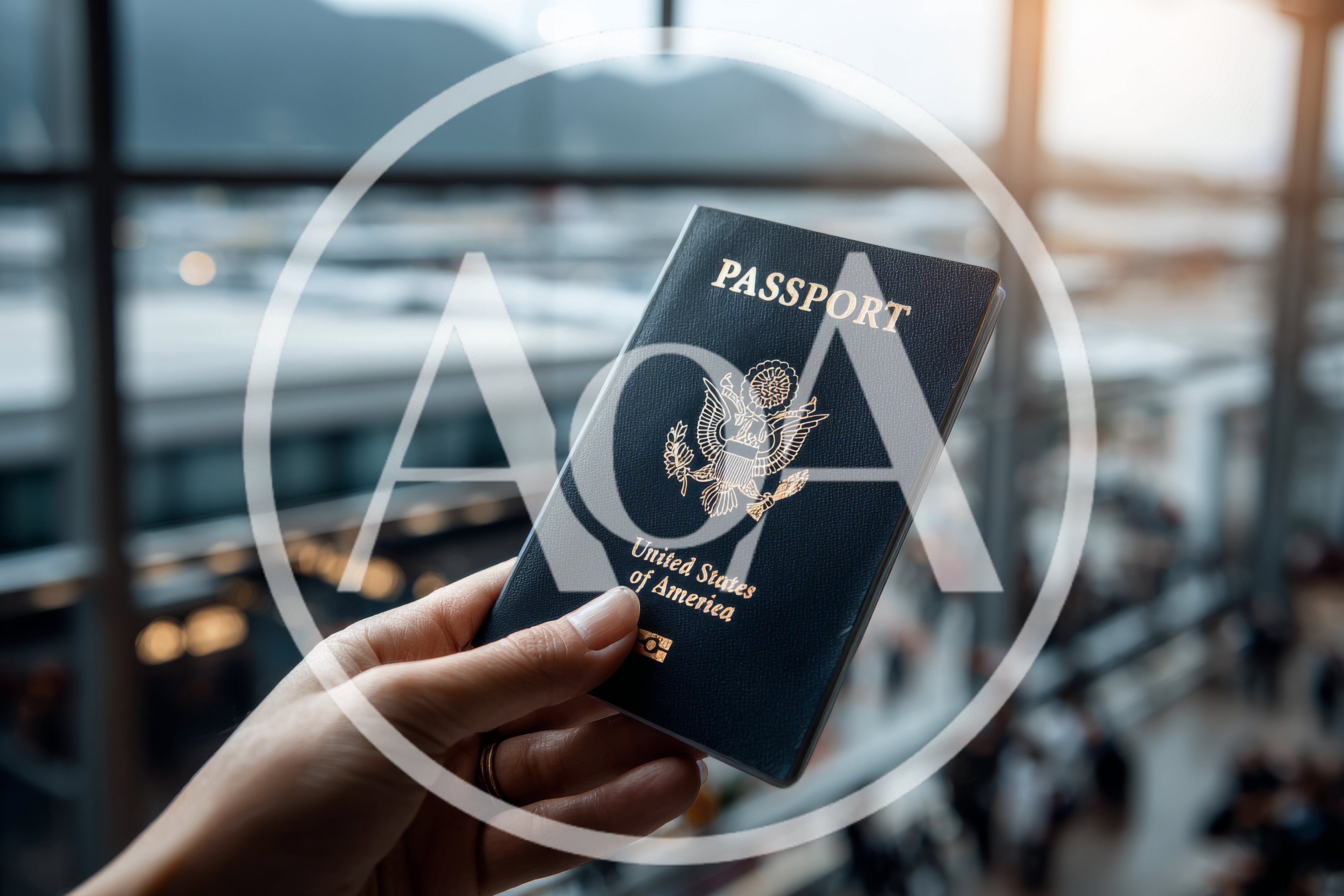 Hand Holding A United States Passport At An Airport