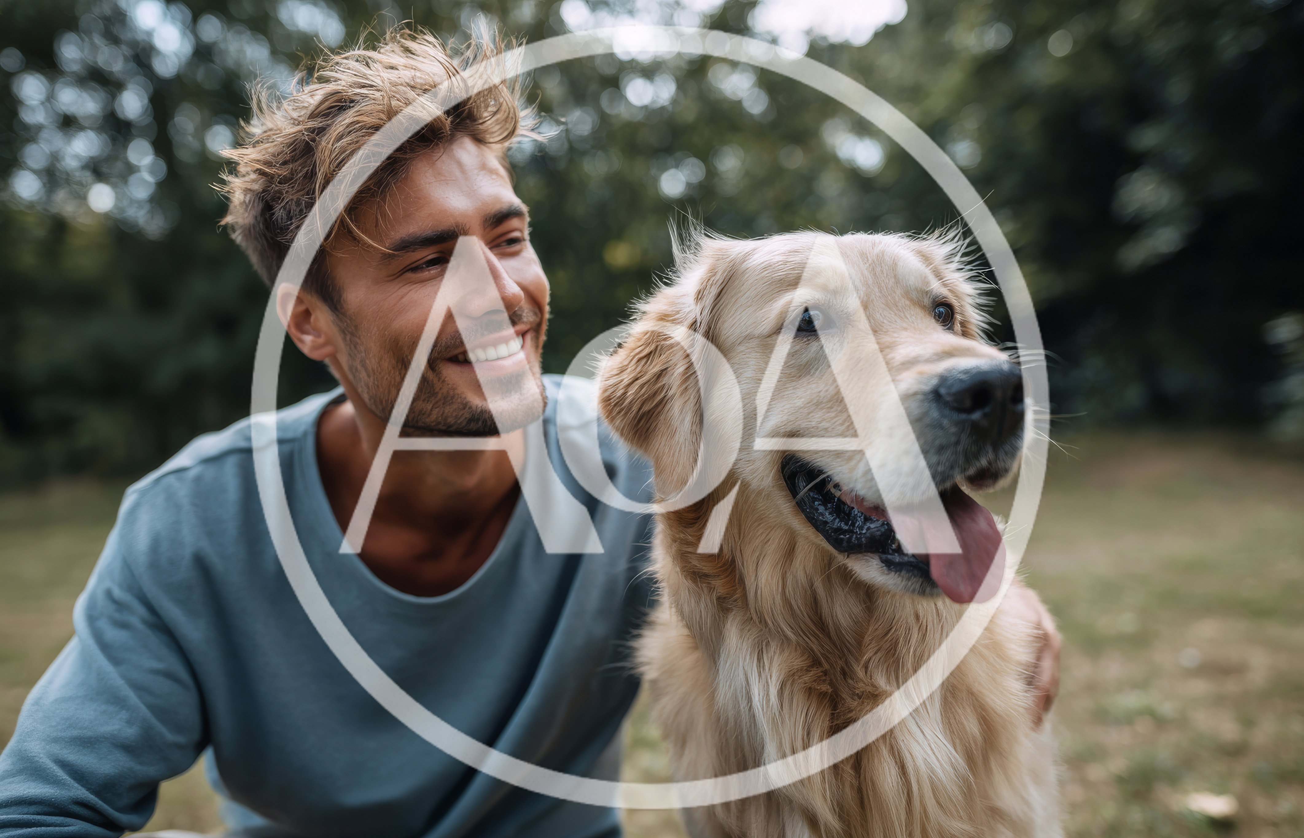 Young Man Bonding With Golden Retriever Outdoors