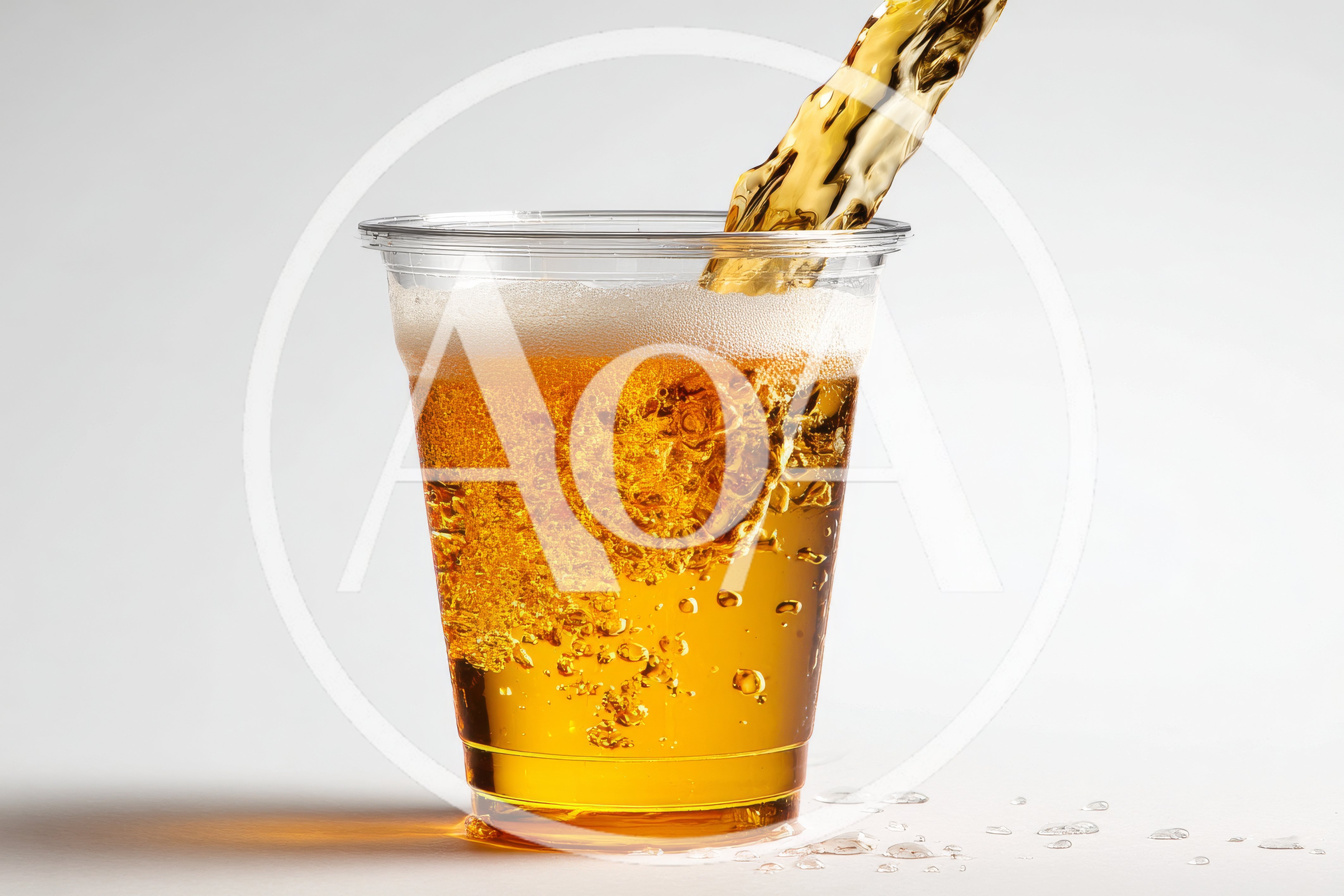 Golden Beer Pouring Into A Clear Plastic Cup