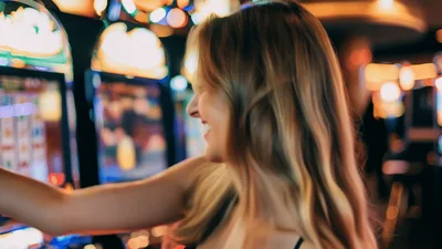 Happy Young Woman Smiling In A Casino