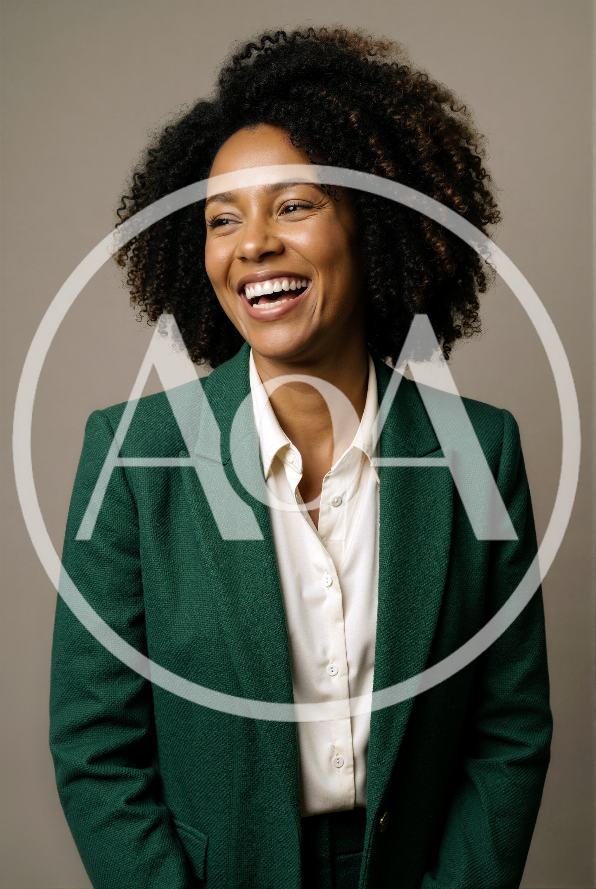 Professional Woman Laughing In Green Blazer
