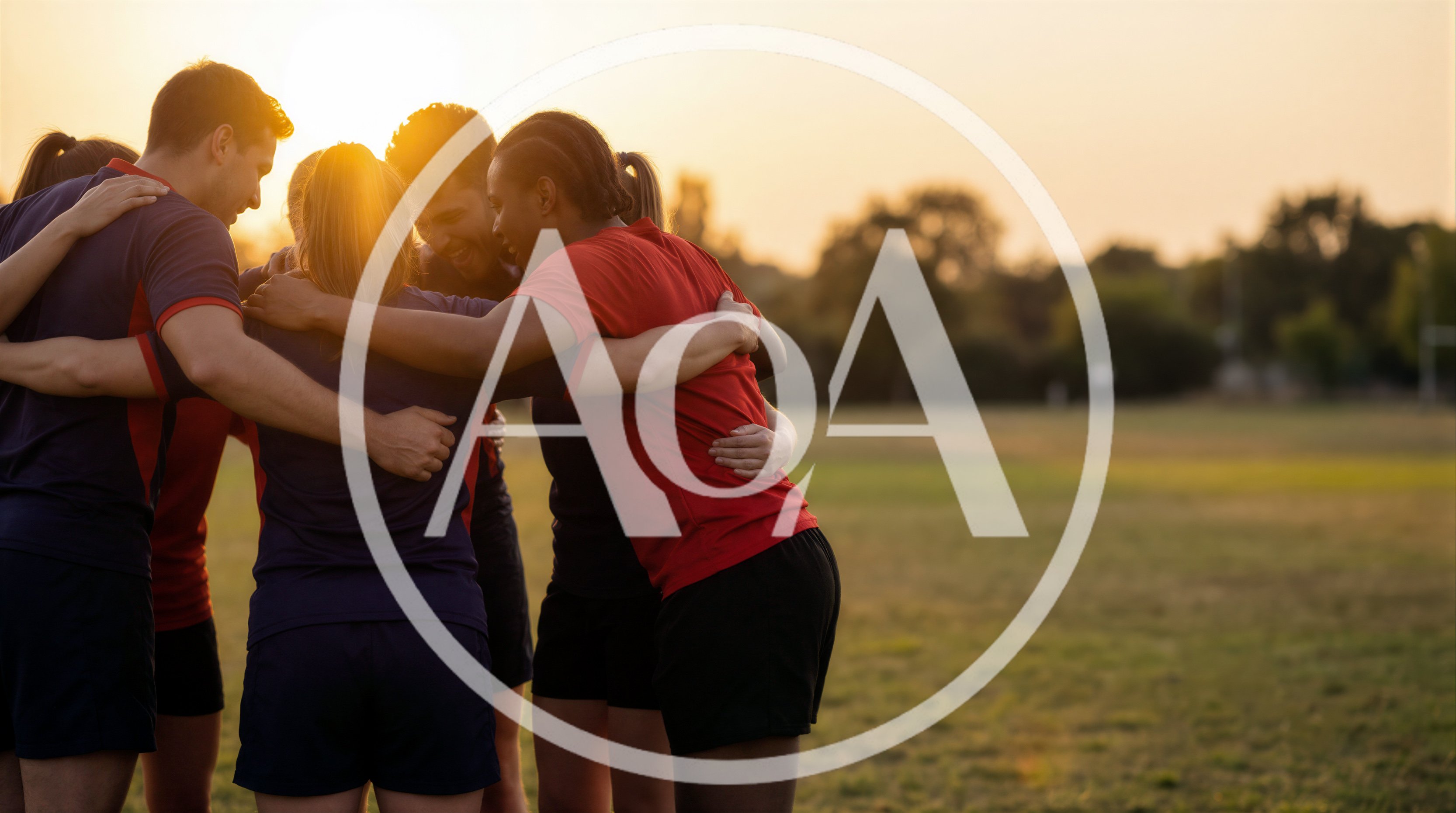 Diverse Sports Team Huddling Together on Field