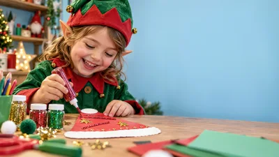 Little Girl Dressed as Elf Crafting Christmas Decorations