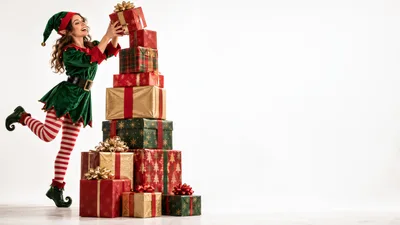 Cheerful Elf Stacking Christmas Presents