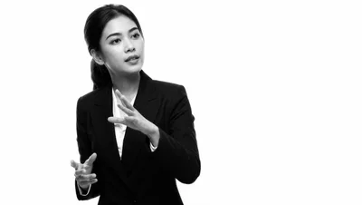 Professional Businesswoman Gesturing During A Presentation
