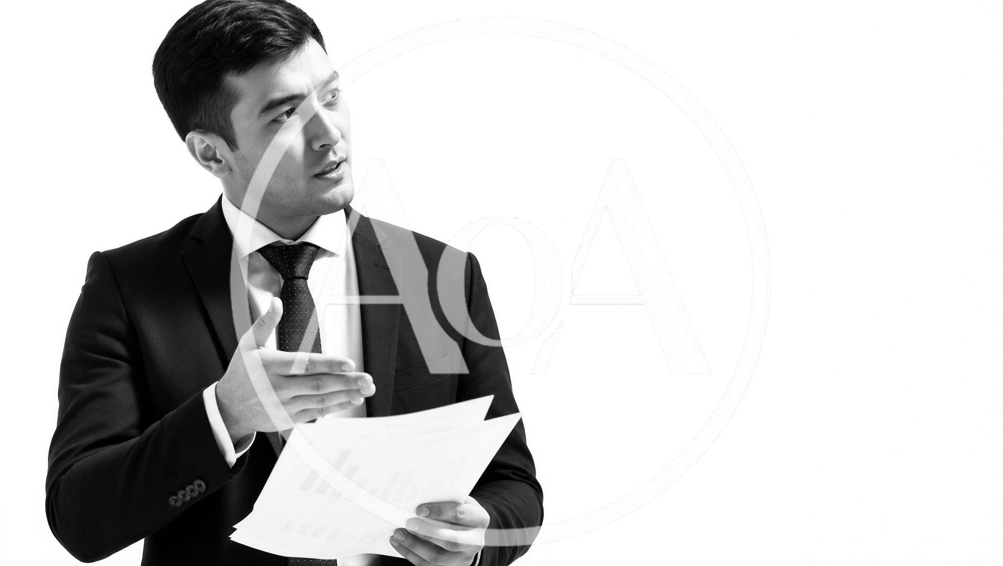 Professional Businessman Presenting Documents In Studio