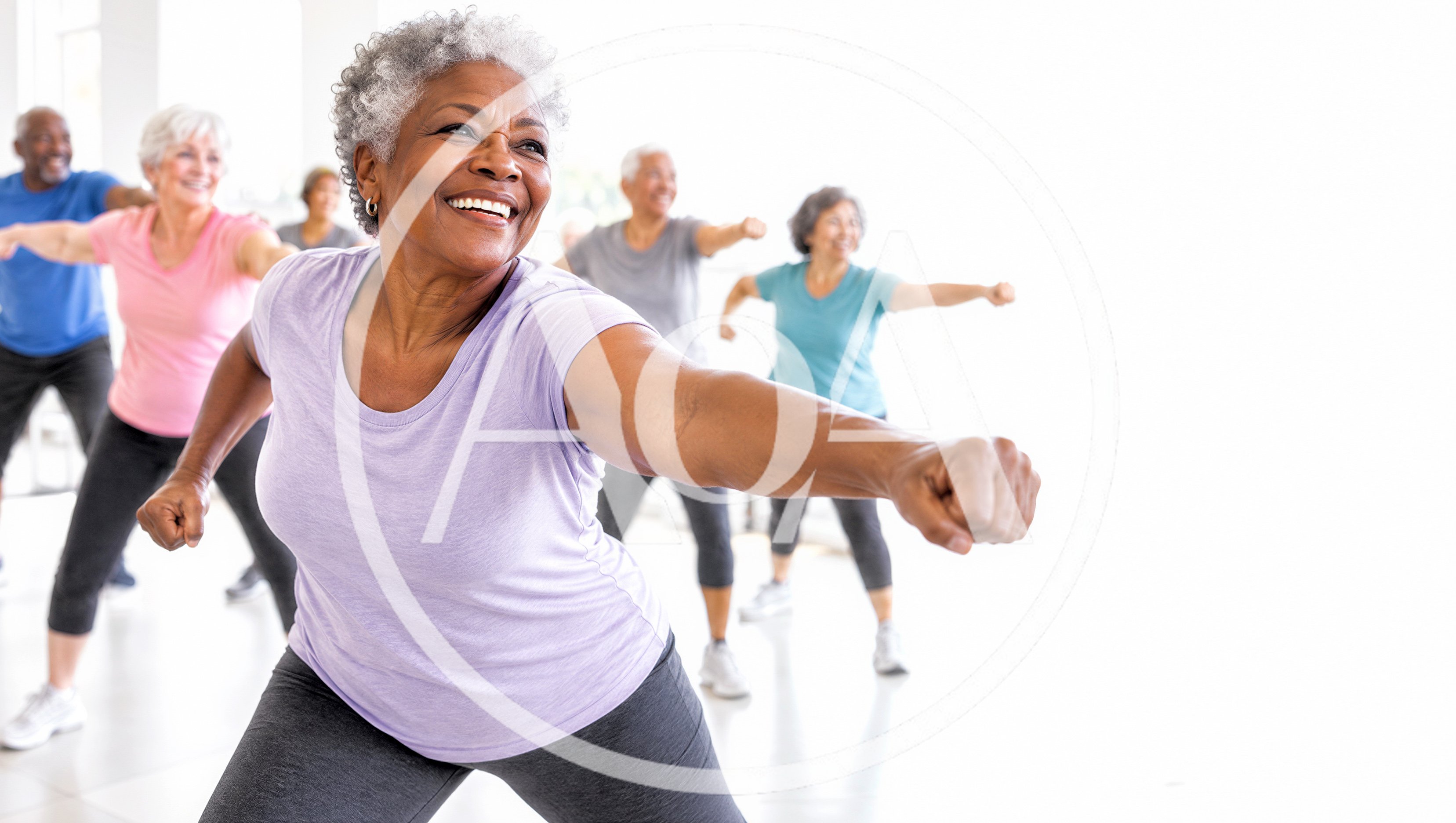 Diverse Seniors Participating In An Aerobic Fitness Class