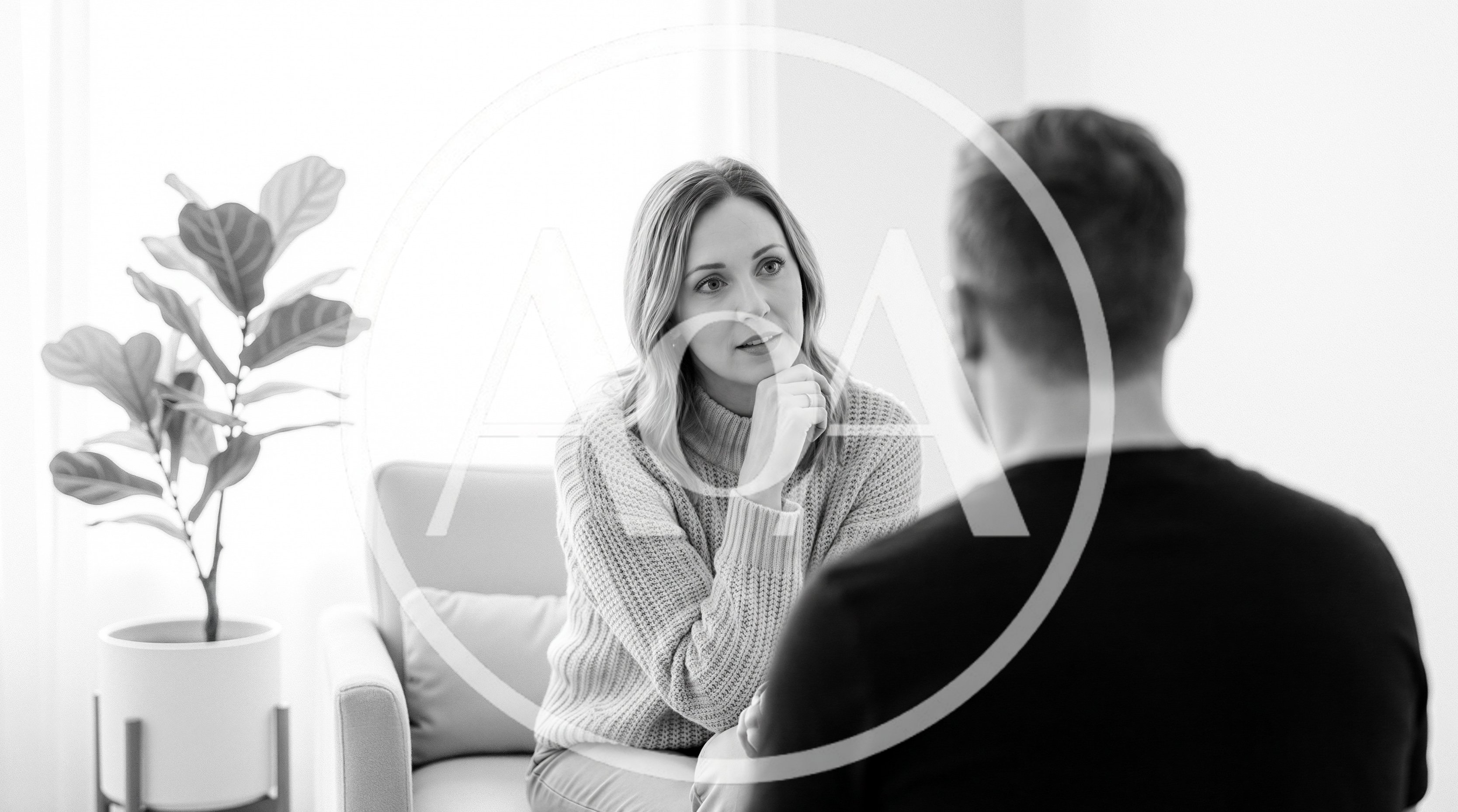 Woman Listening Attentively During A Professional Therapy Session