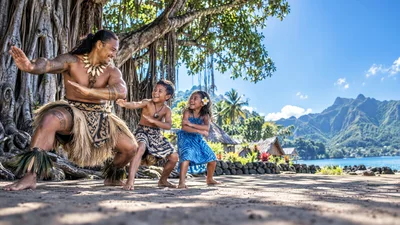 Polynesian Father Teaching Children Traditional Haka Dance