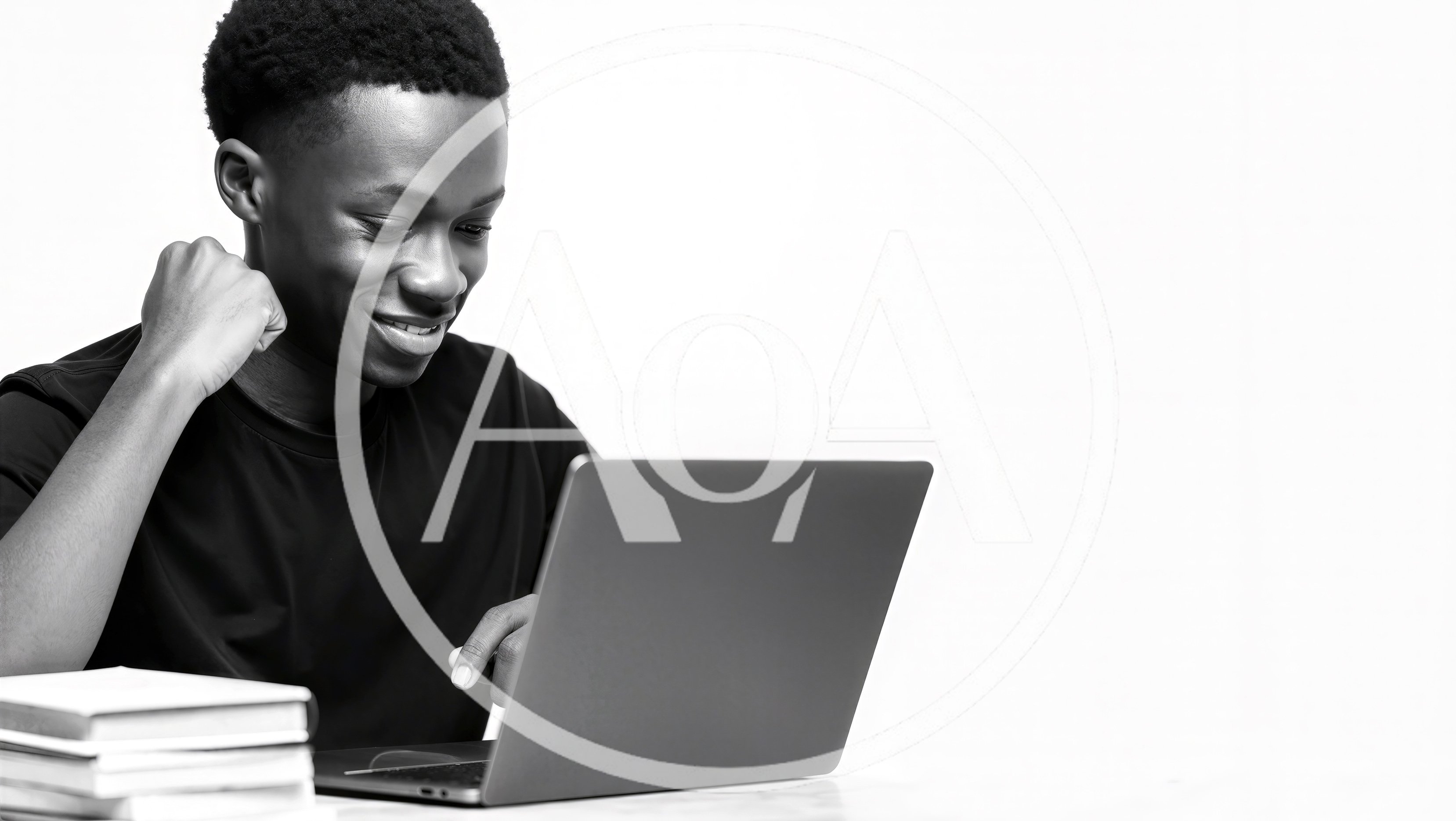 Young Black Man Using Laptop Computer
