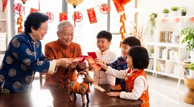 Grandparents Giving Red Envelopes to Grandchildren for Chinese New Year