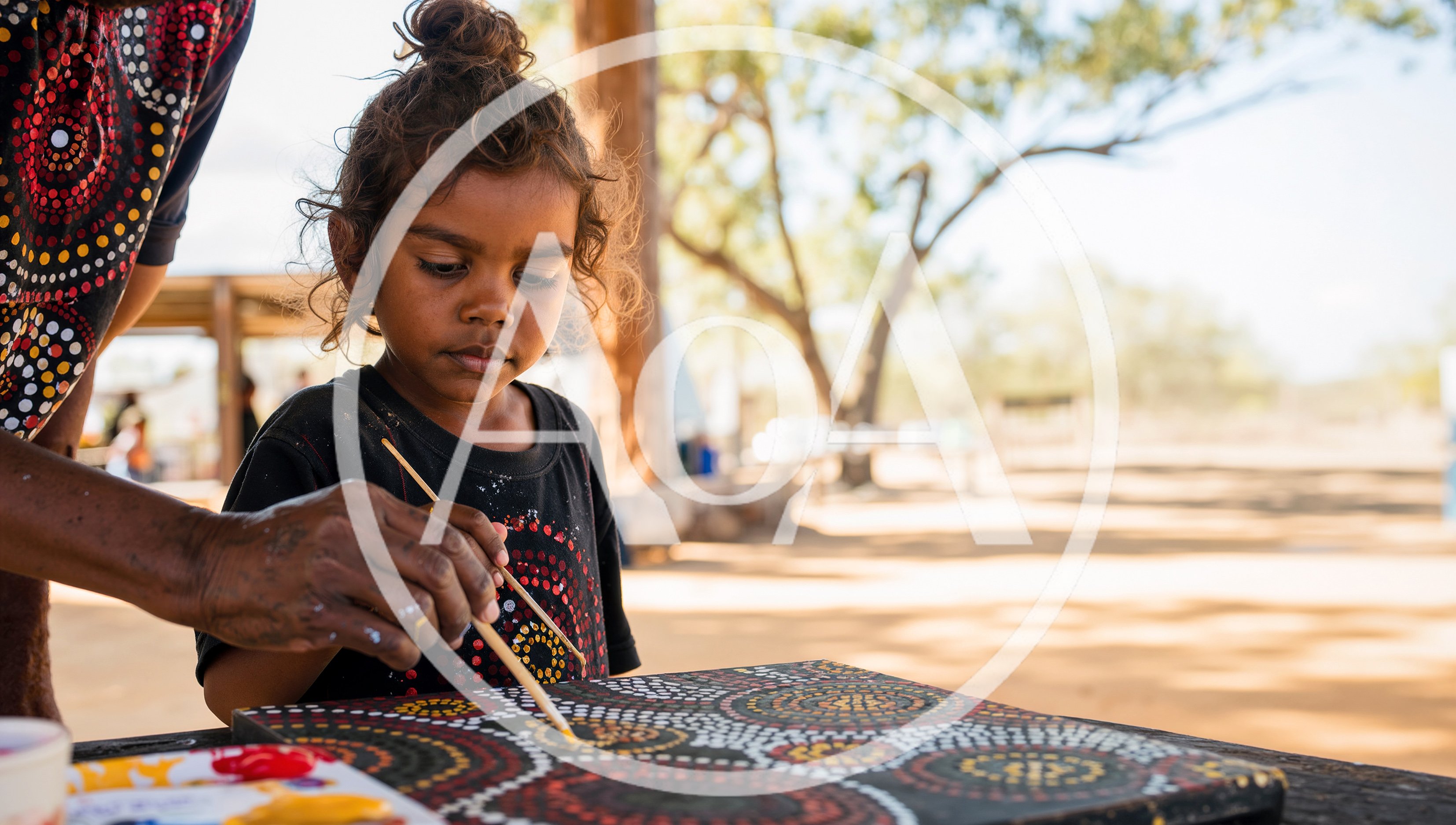 Indigenous Australian Child Painting Dot Art With Elder