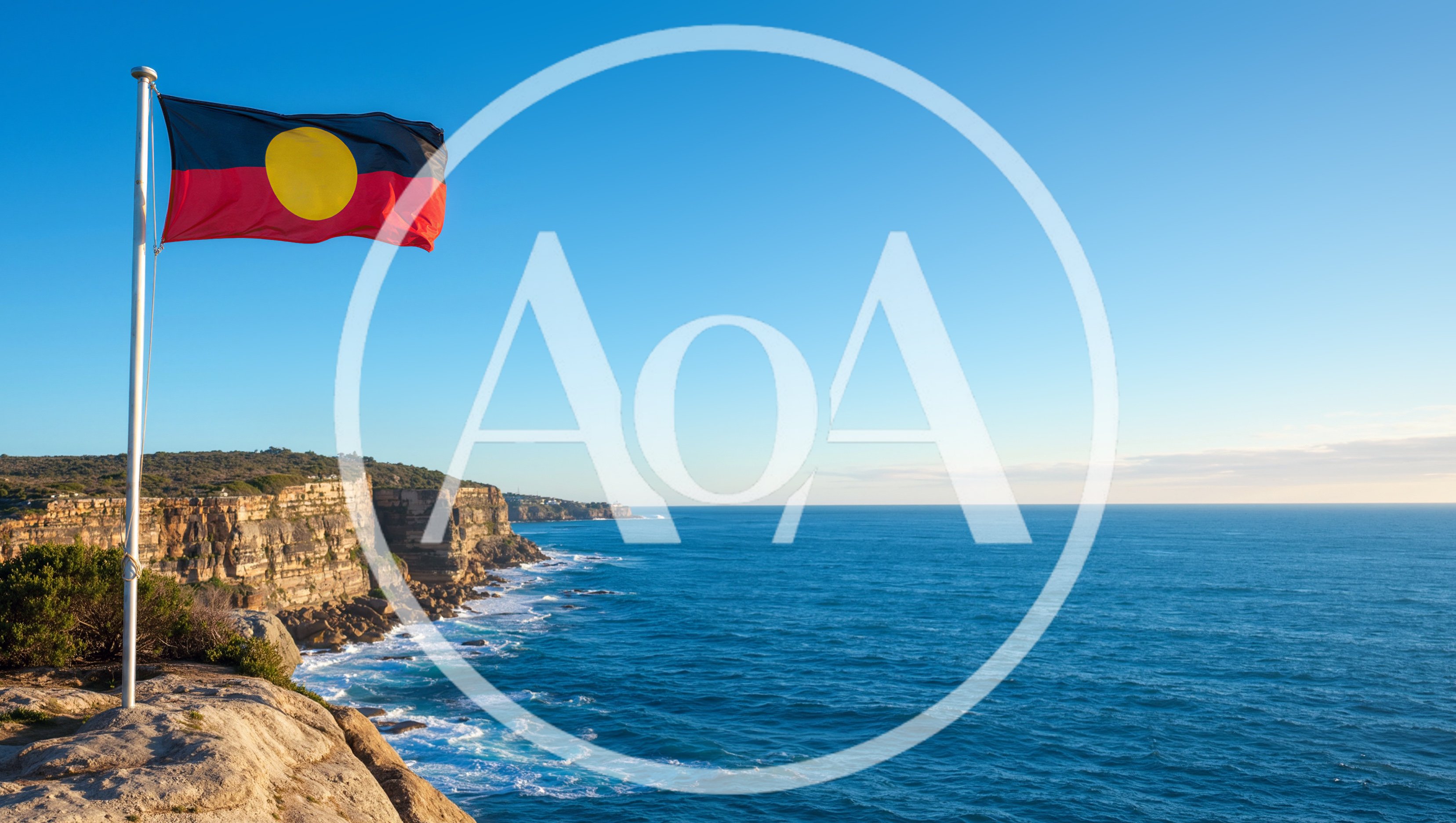 Australian Aboriginal Flag Flying Over Coastal Cliffs
