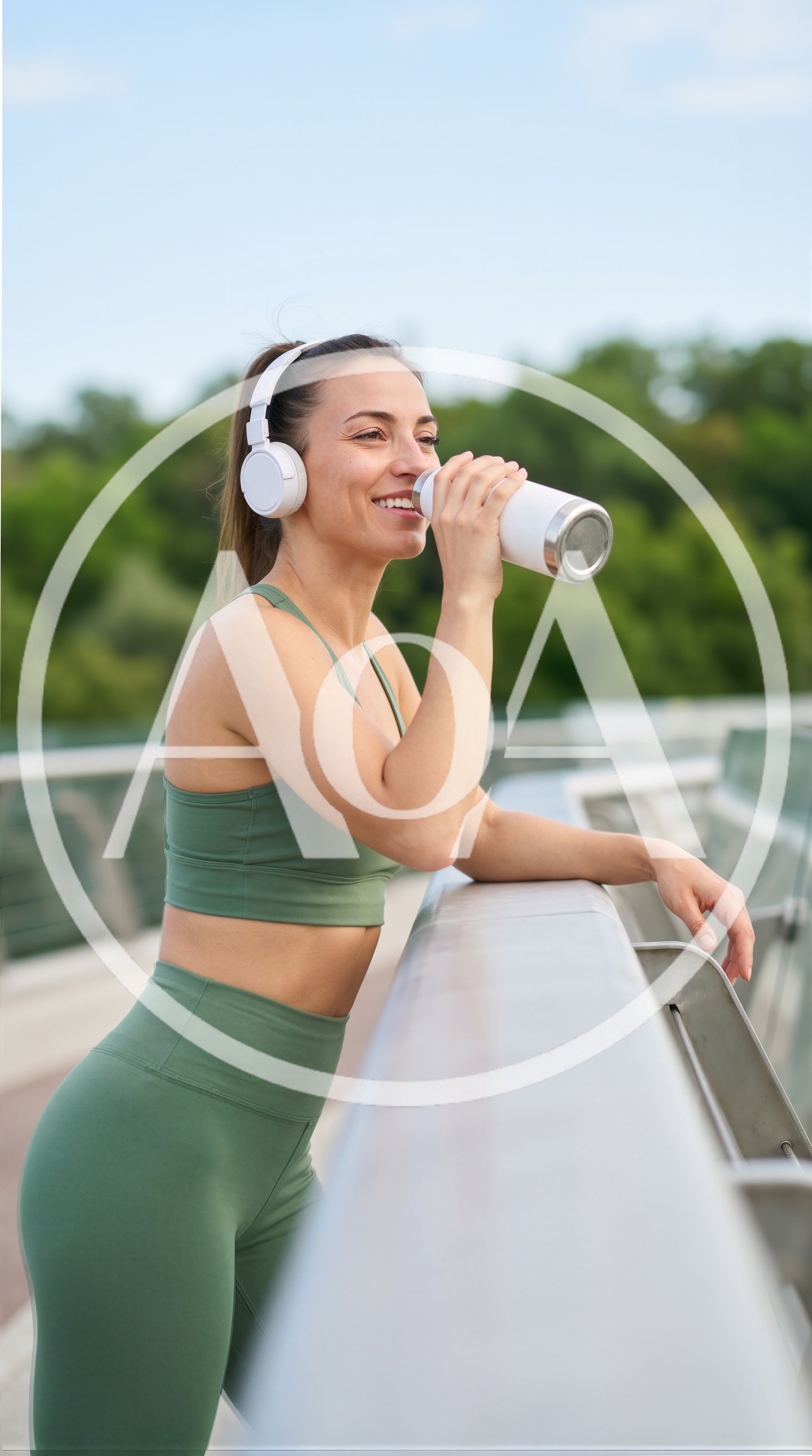 Fit Woman Drinking Water After Outdoor Workout