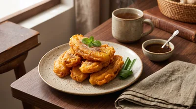 Fried Banana Fritters Served On A Rustic Plate