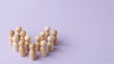 Wooden Peg Dolls Arranged In A Group