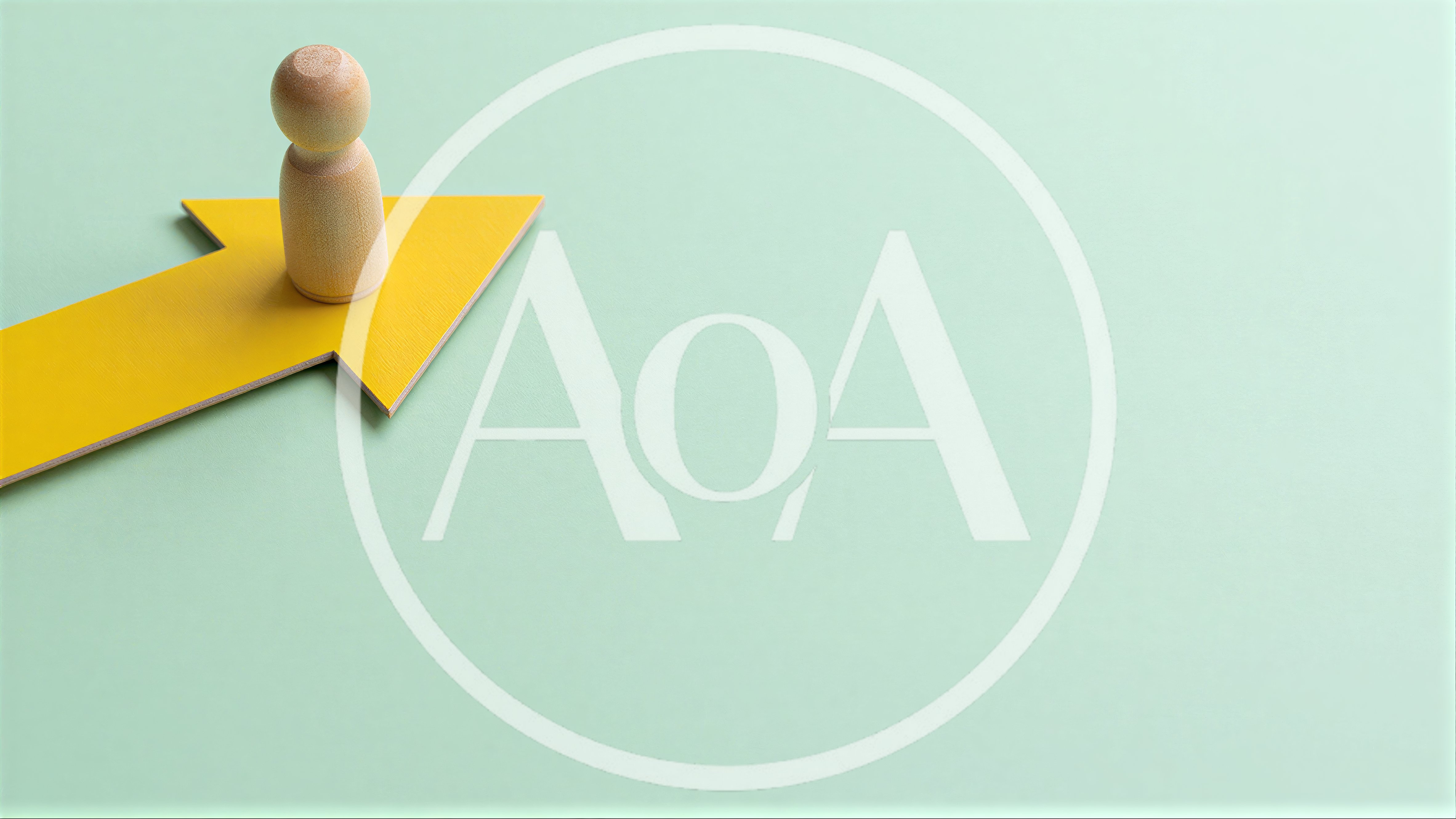 Wooden Peg Doll Standing On A Yellow Arrow