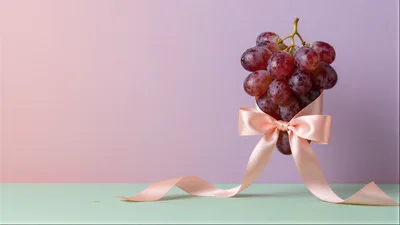 Bunch of Red Grapes Tied with Pink Ribbon