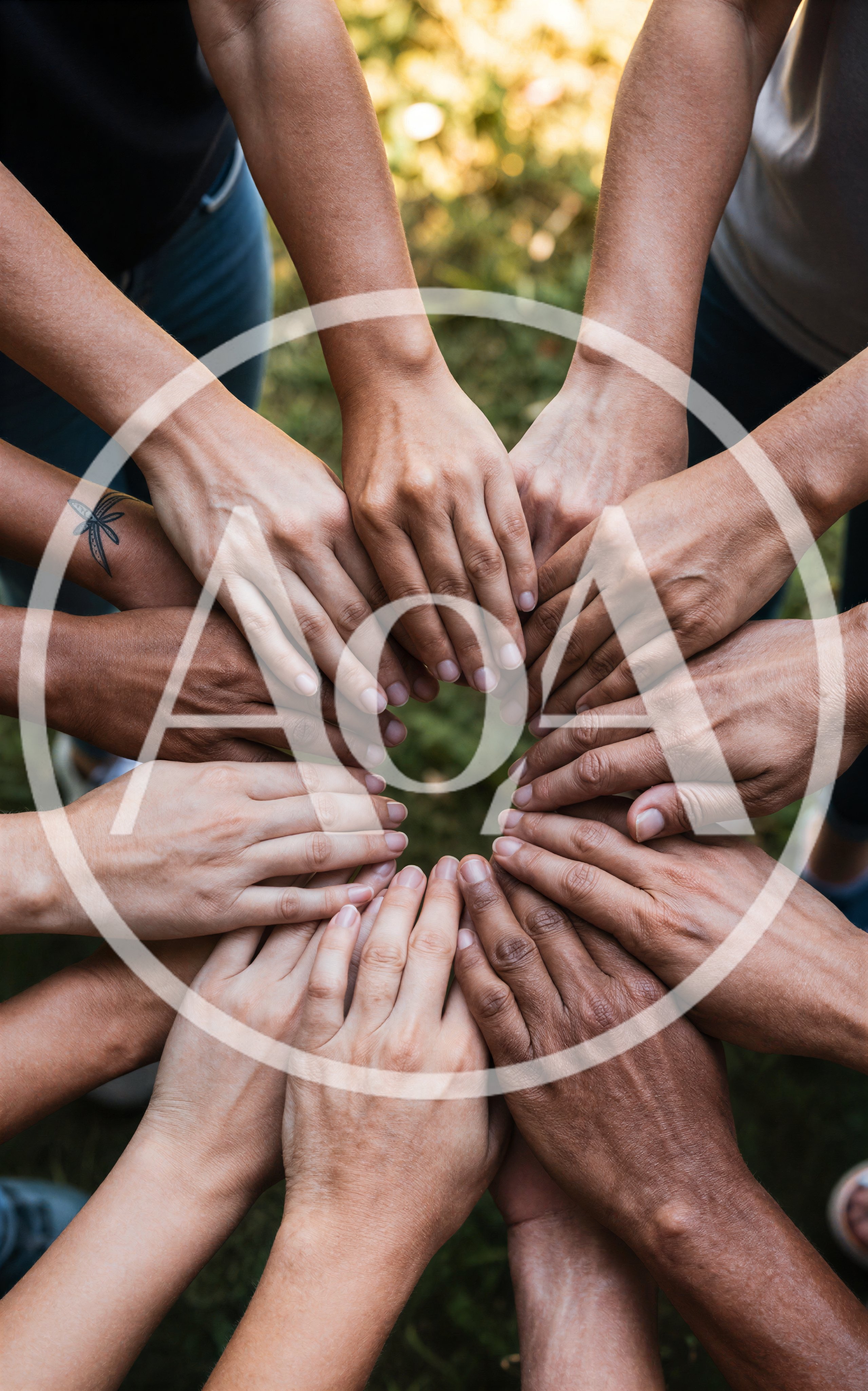 Diverse Group Of People Joining Hands In Unity