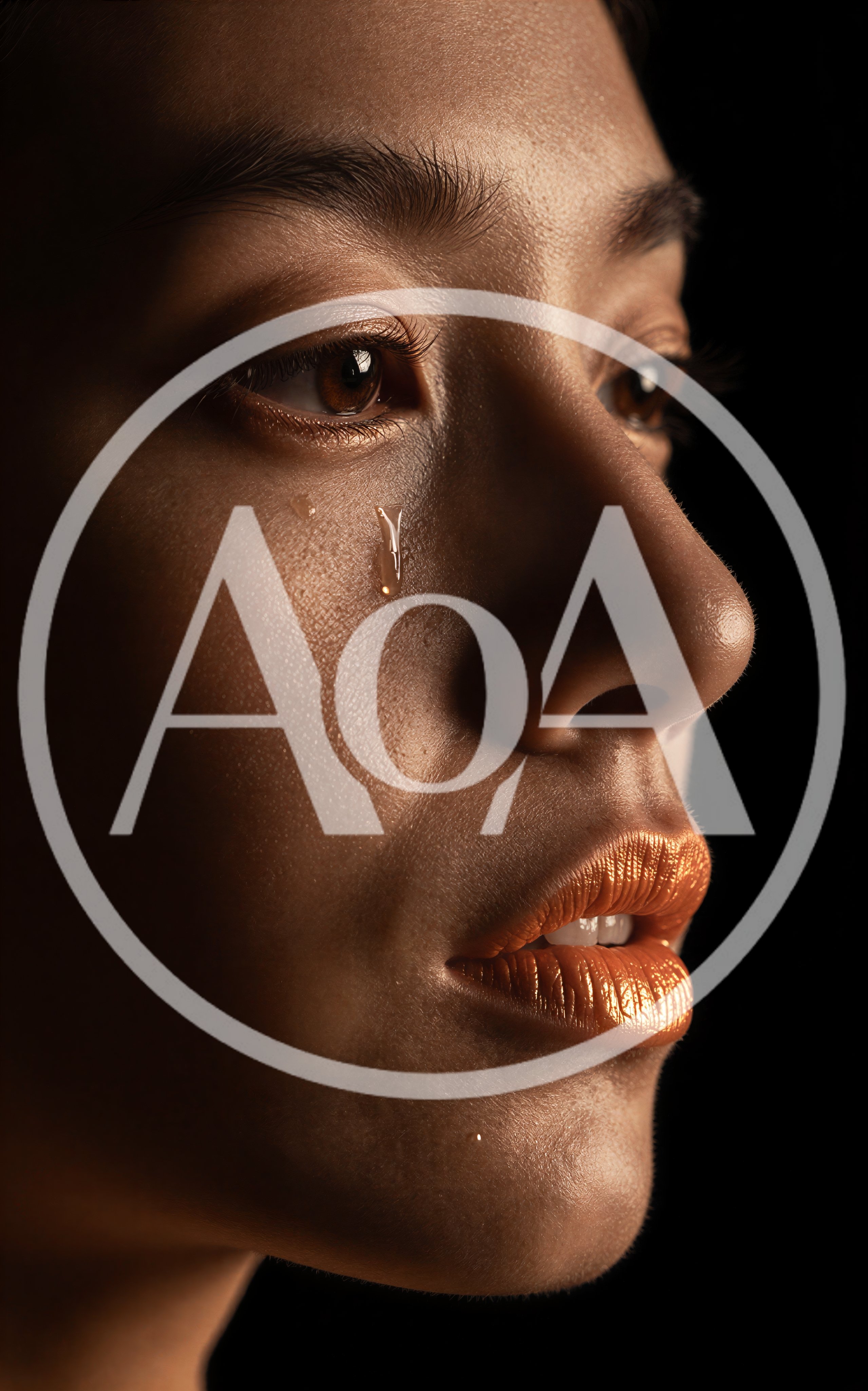 Close Up Portrait Of A Woman With A Tear