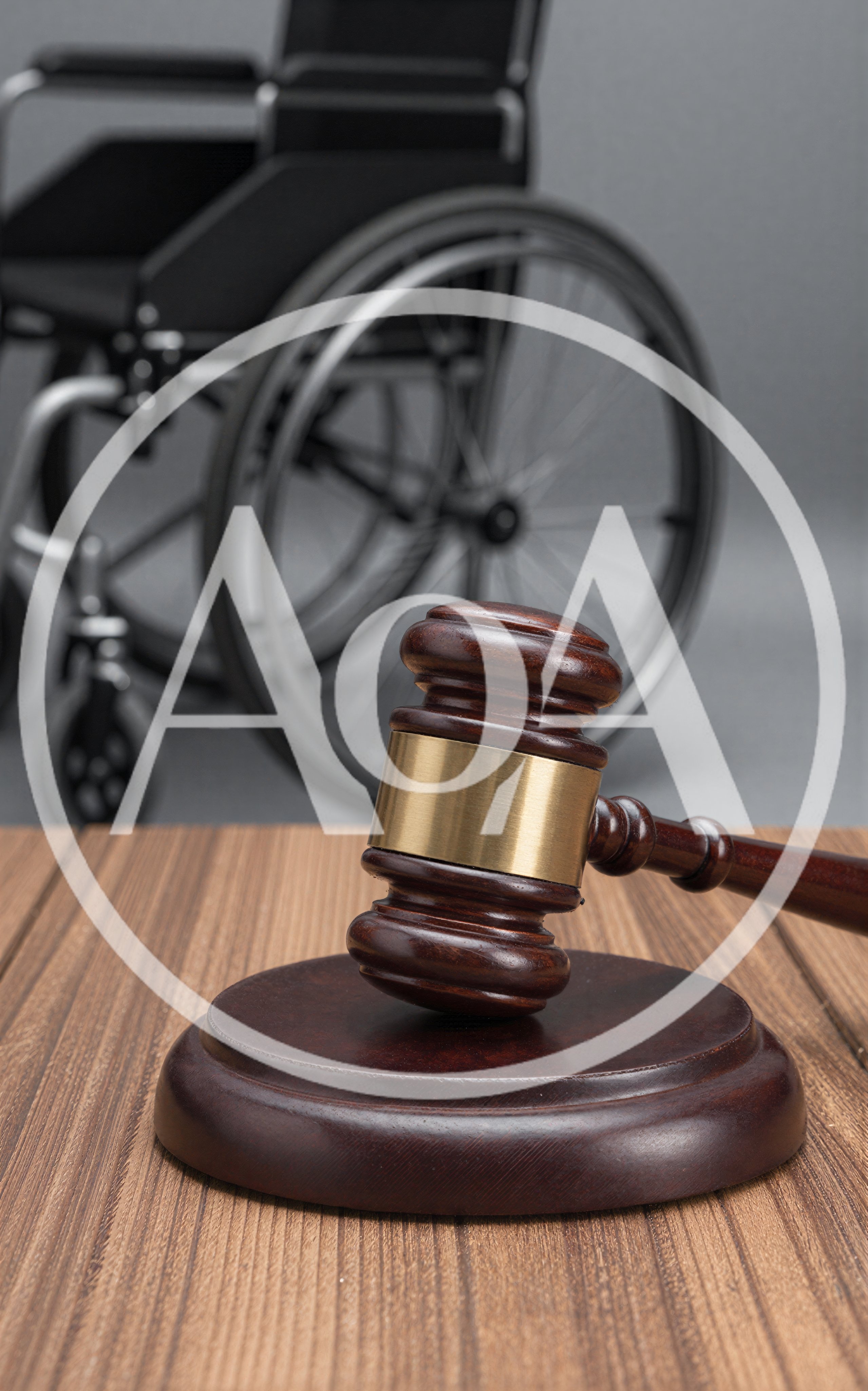 Wooden Gavel And Sound Block With Blurred Wheelchair