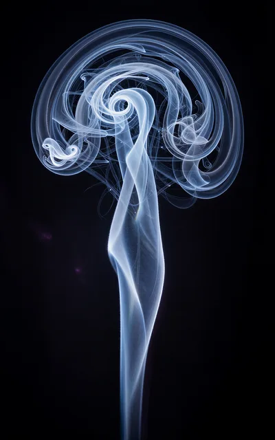 Abstract Swirling Smoke Trails Against Black Background