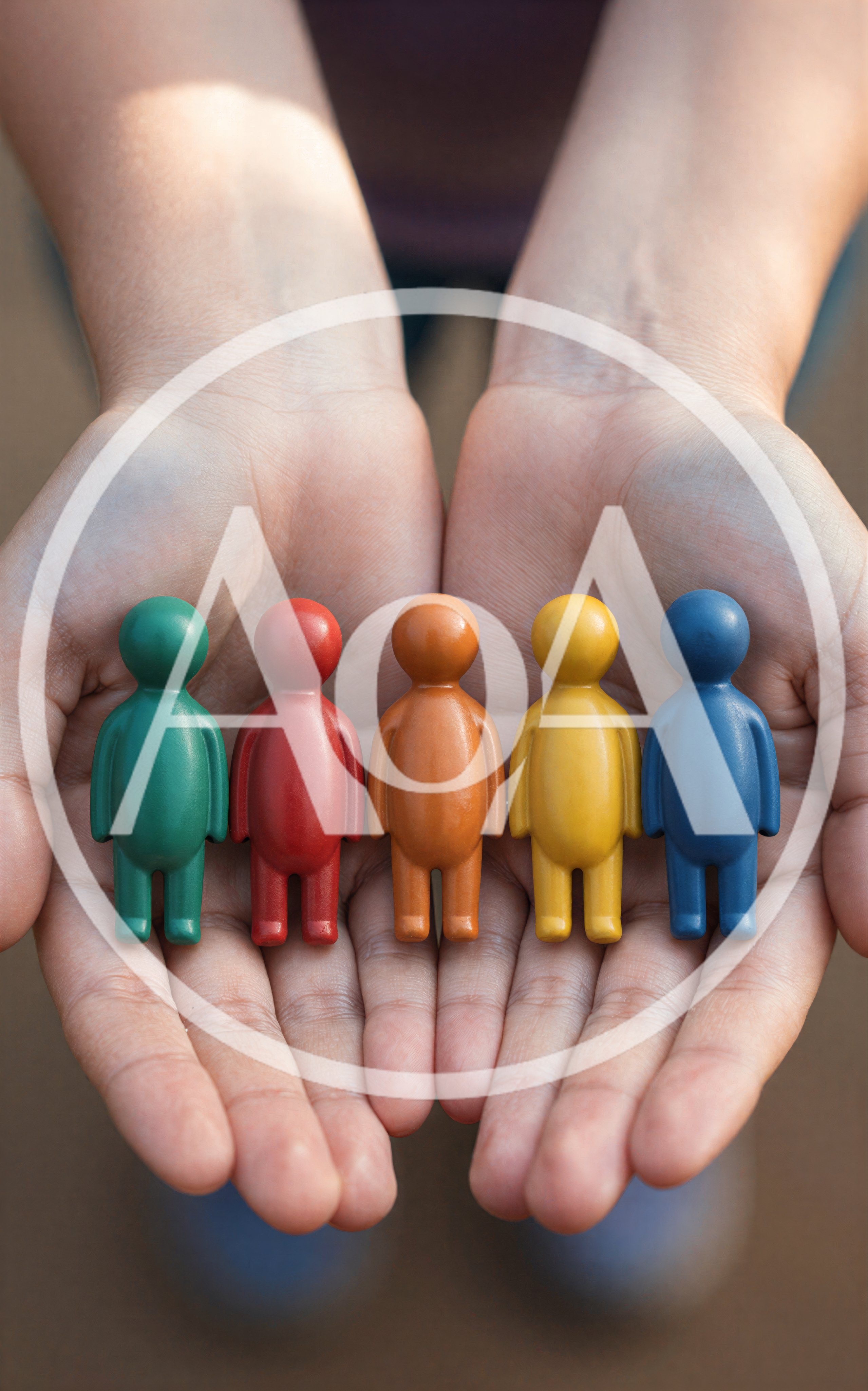 Hands Holding Five Colorful Wooden Human Figurines