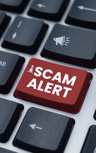 Red Scam Alert Key on Computer Keyboard
