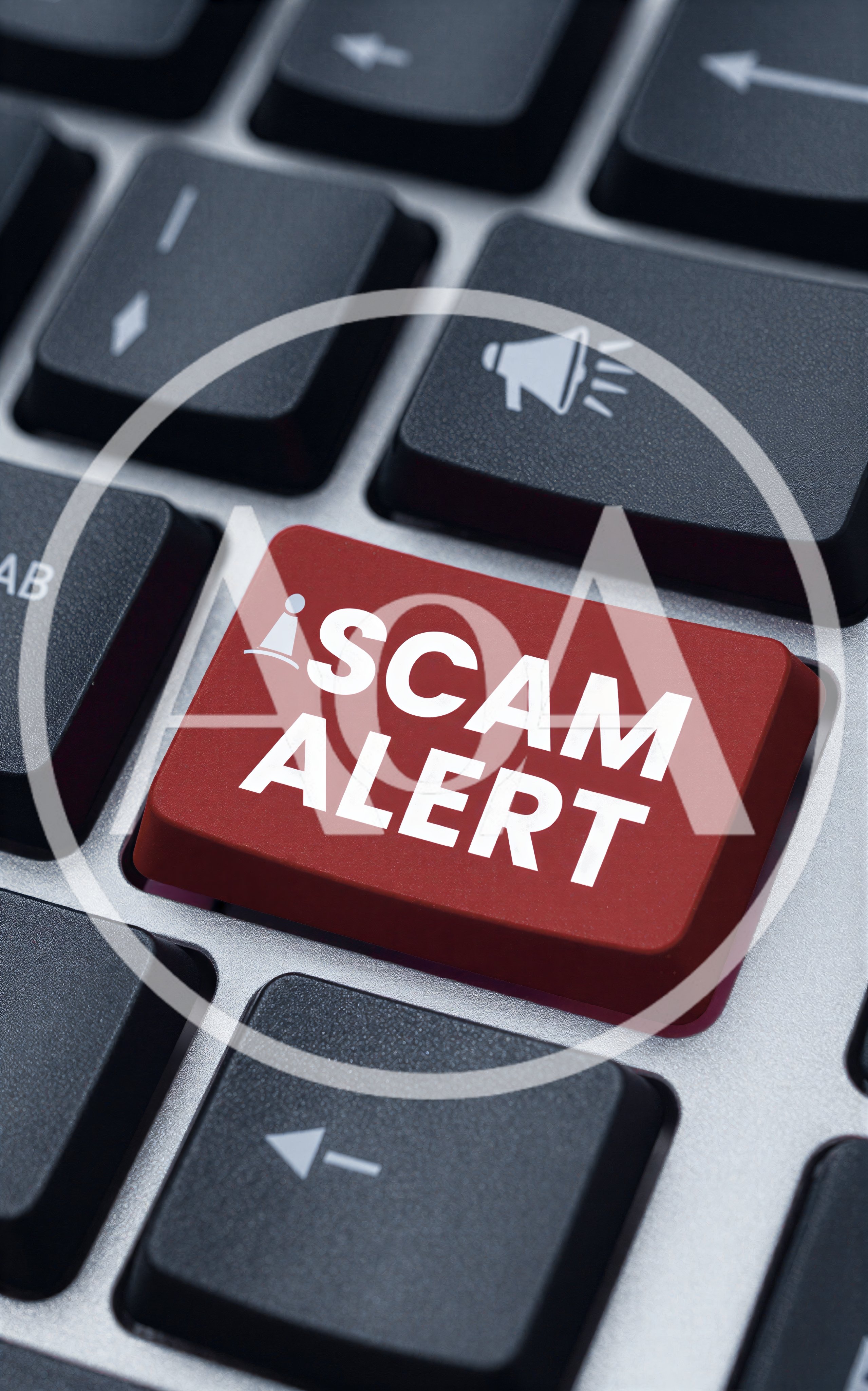 Red Scam Alert Key on Computer Keyboard