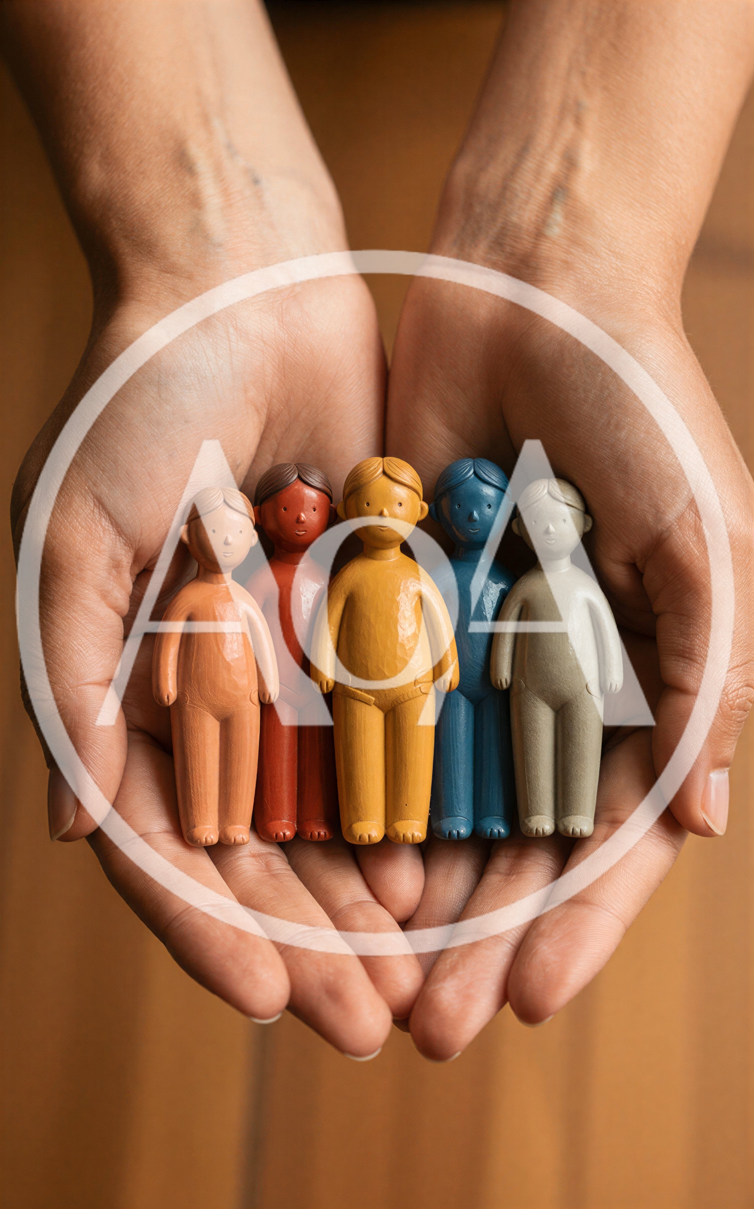 Hands Holding Five Colorful Wooden Figurines